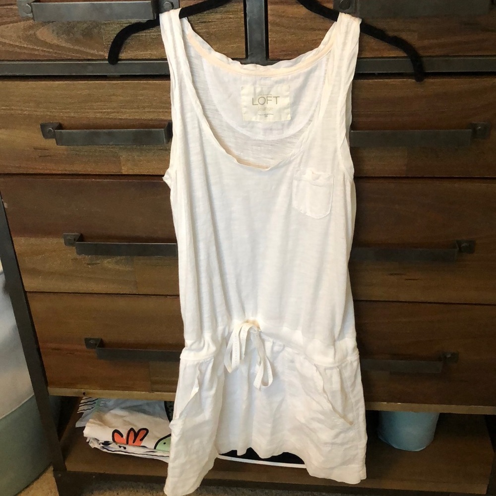 white romper with pockets